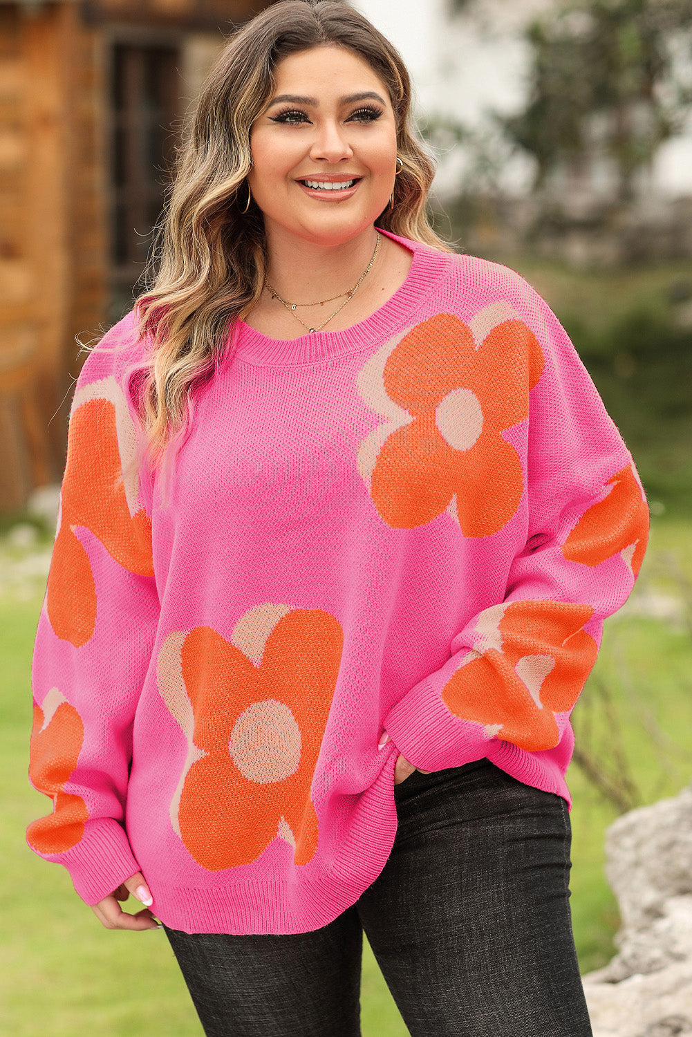 Bonbon pulover s cvjetnim uzorkom veće veličine na spuštena ramena