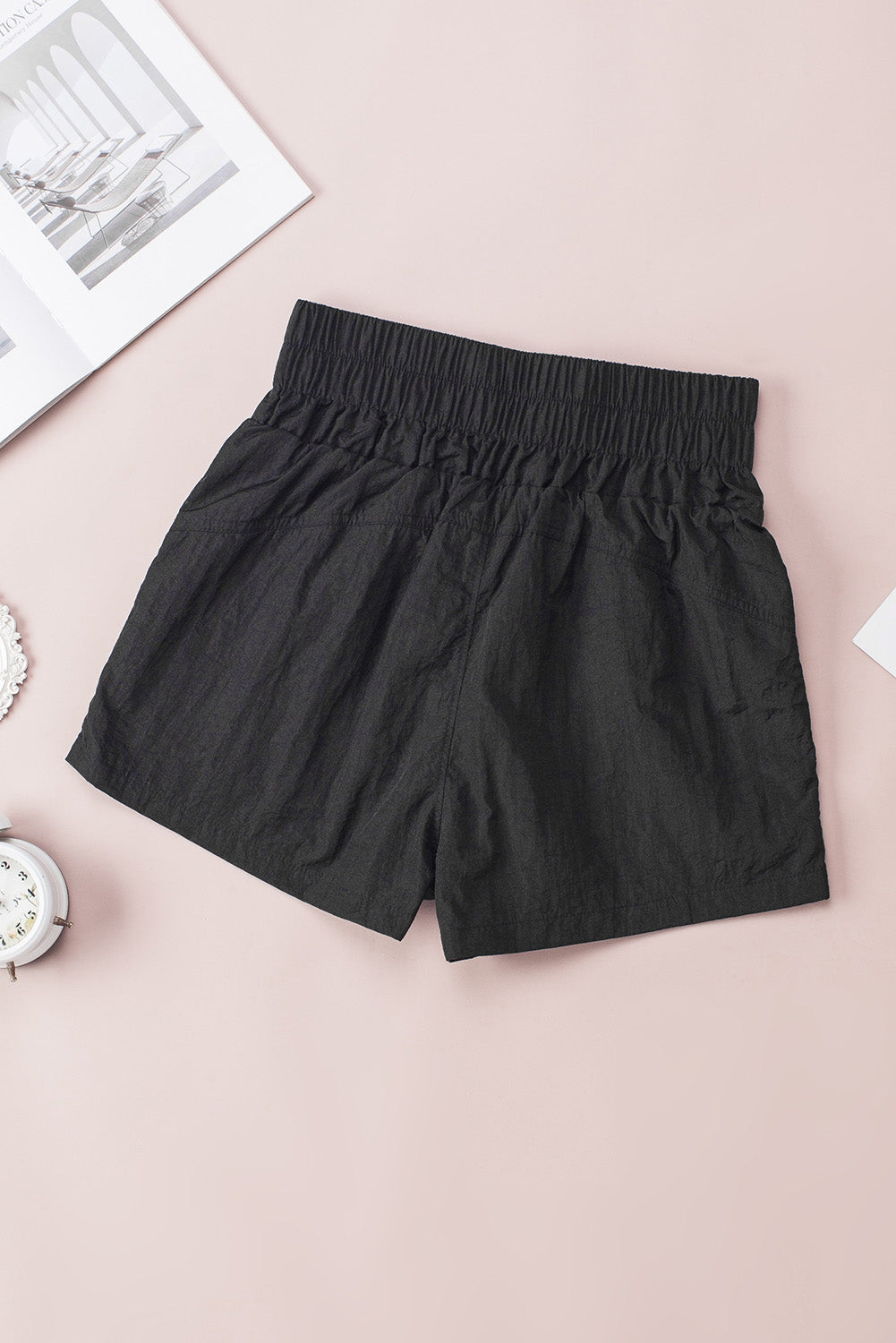 Crne elastične kratke hlače s bočnim džepovima visokog struka