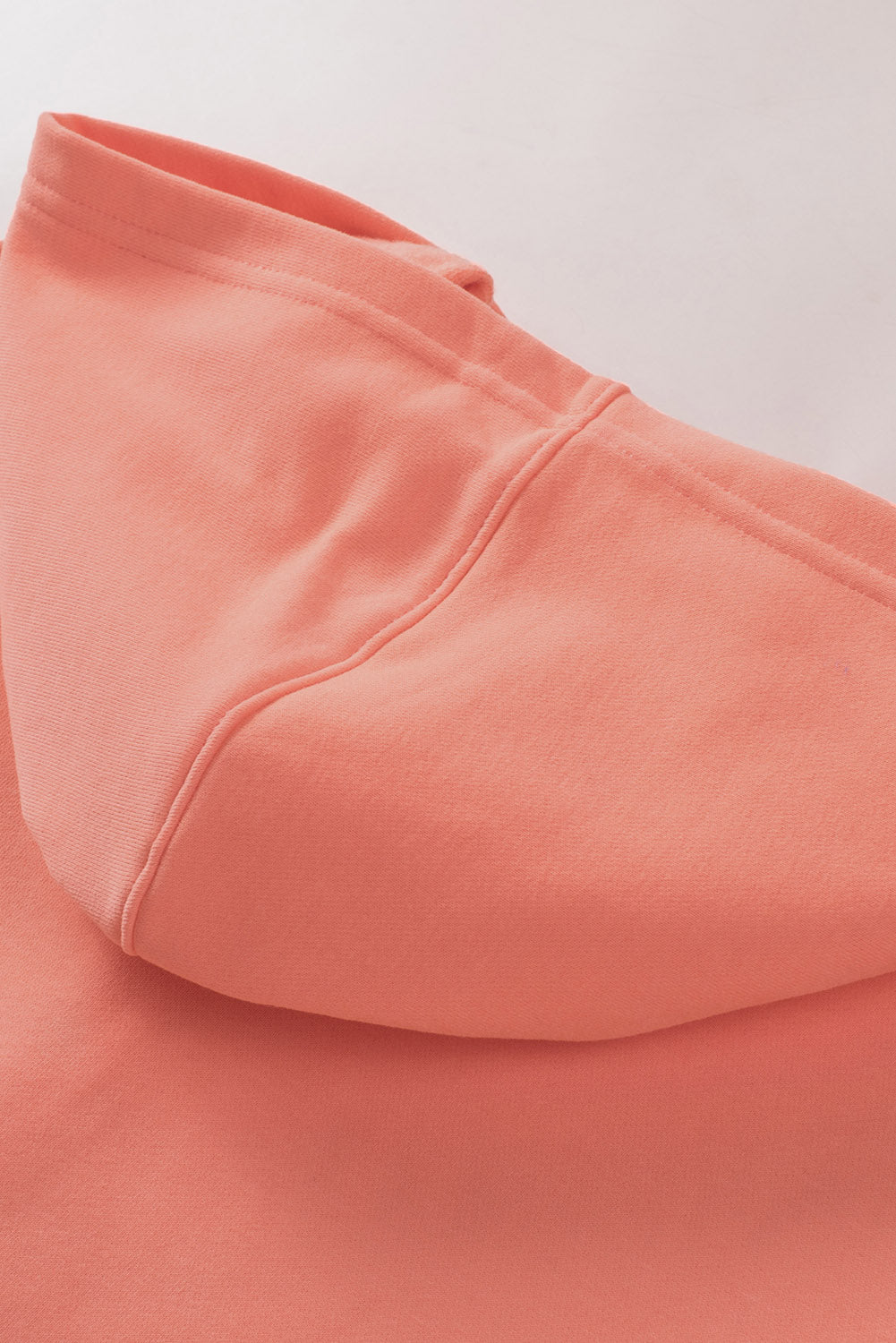 Narančasta majica s kapuljačom s džepom u obliku krila šišmiša