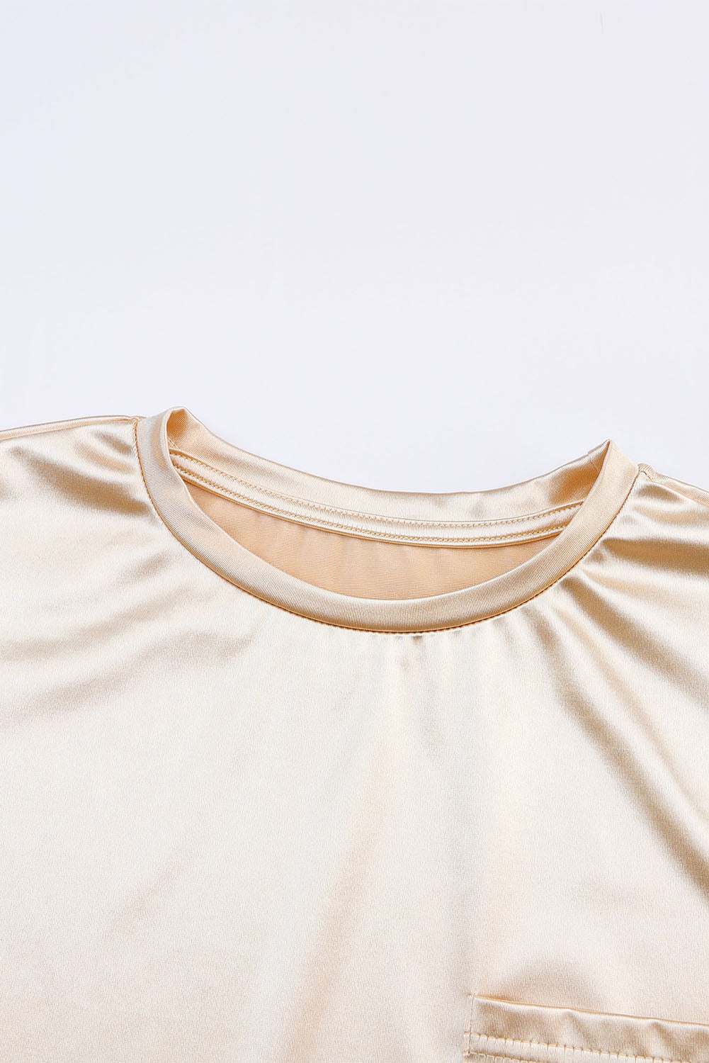 Majica dugih rukava sa svjetlucavim prsima u boji marelice i okruglog izreza