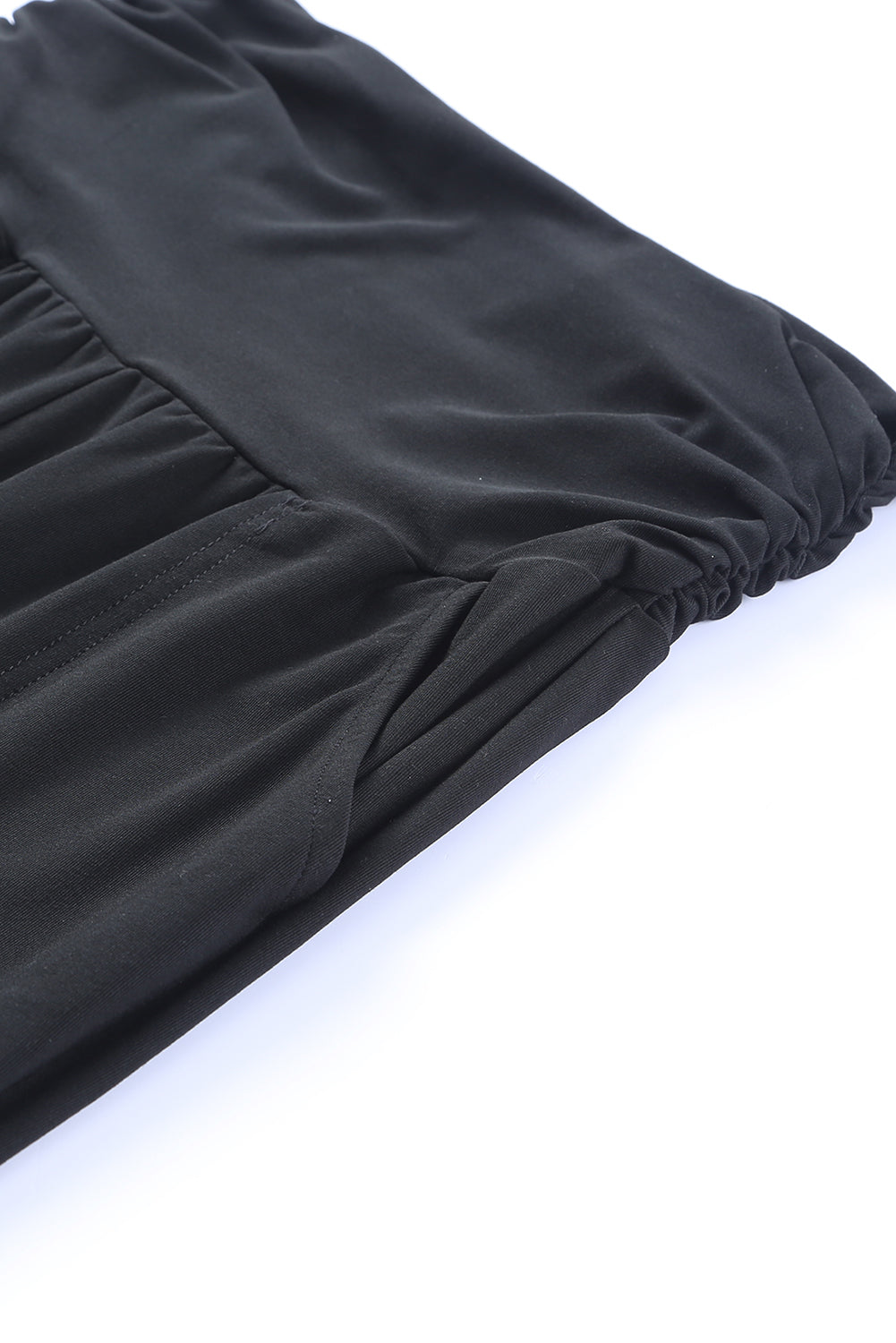 Crne plisirane tajice s džepovima visokog struka