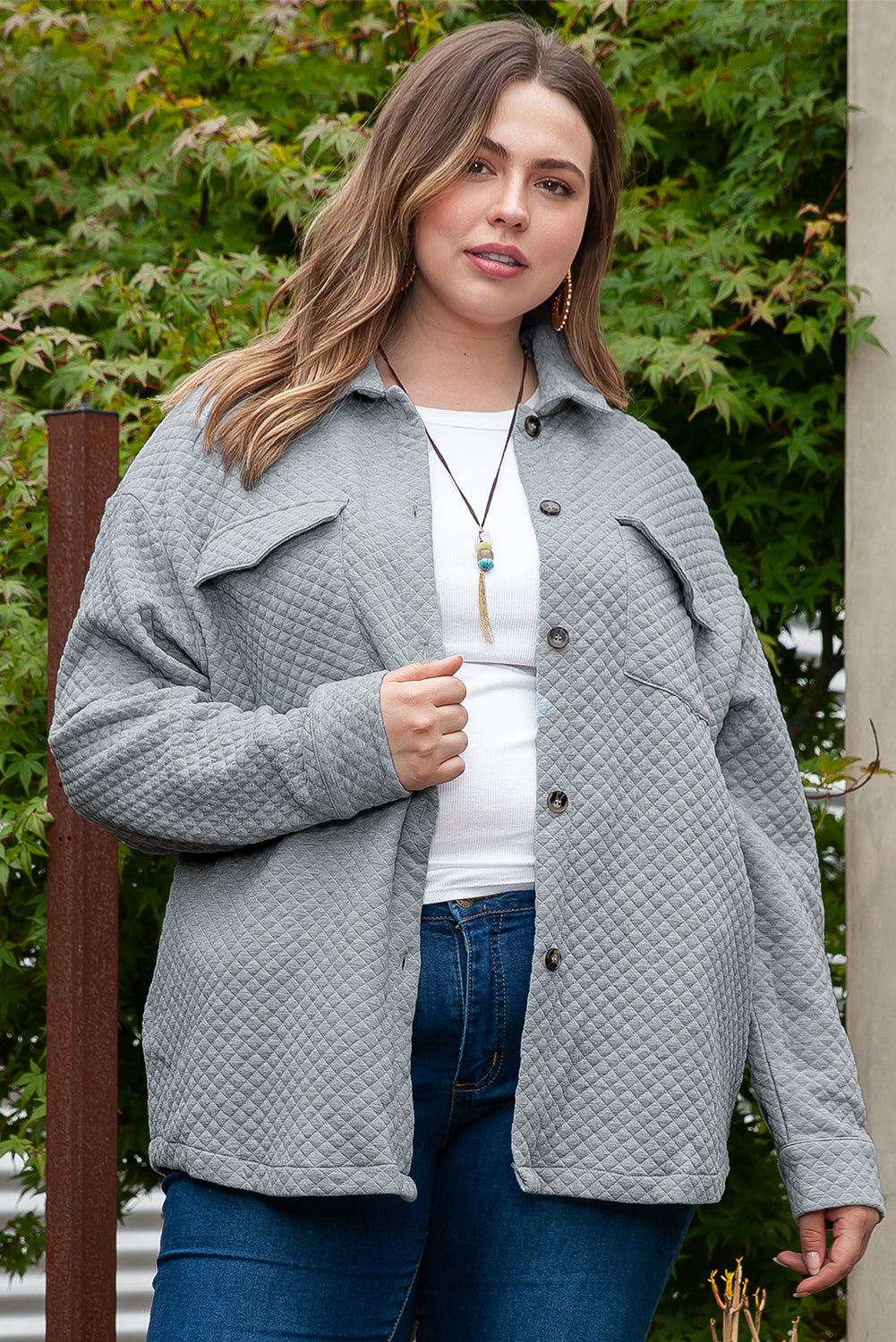 Siva jakna s prošivenim uzorkom veće veličine