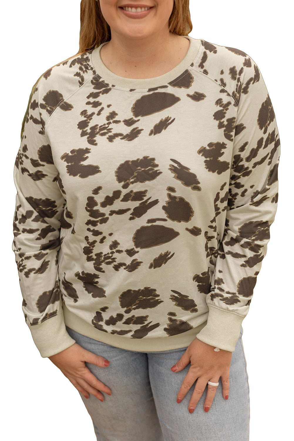 Pulover pulover veličine s okruglim izrezom i životinjskim uzorkom