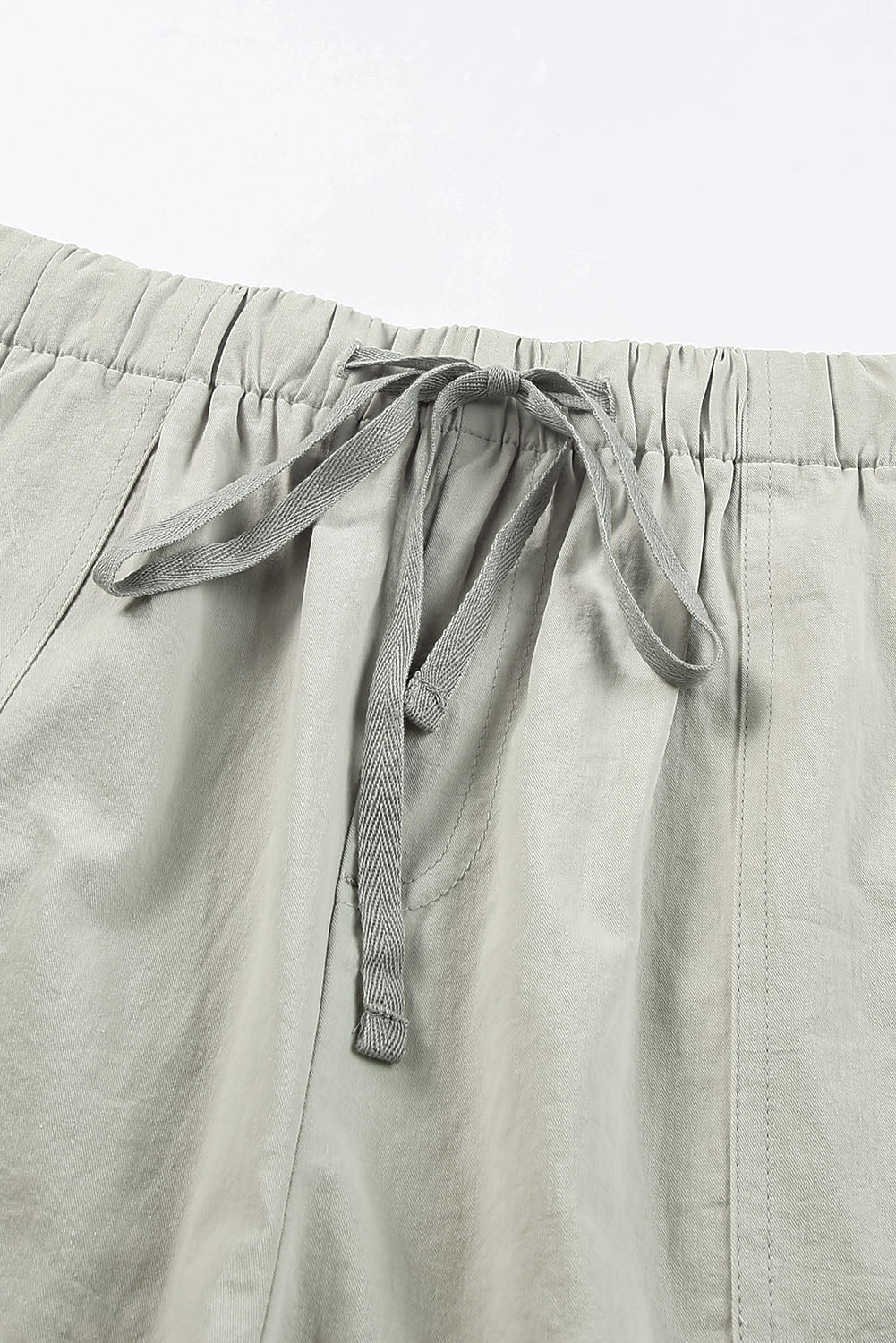 Zelene kratke hlače s džepovima s vezicom u struku