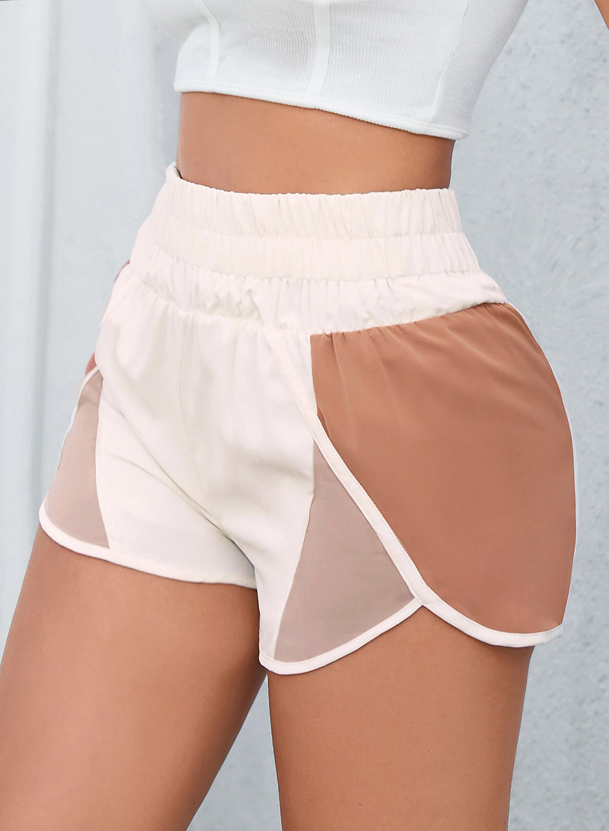 Aprikosenfarbene Block-Shorts mit Schlitz und hoher Taille