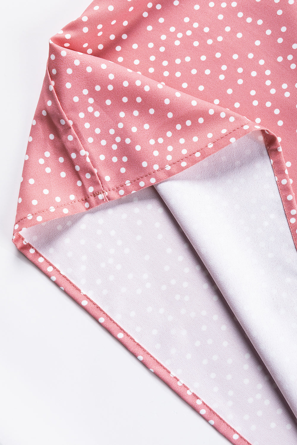 Rožnata bluza s pikami in naborki, s plapolastimi rokavi in ​​ovratnikom
