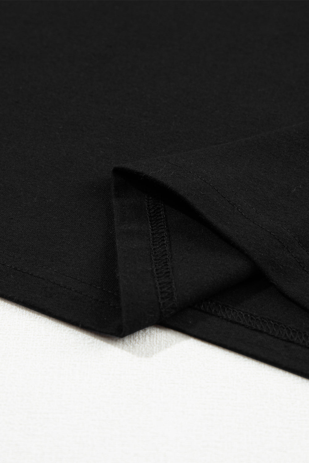 T-shirt noir froncé à manches bouffantes et col rond