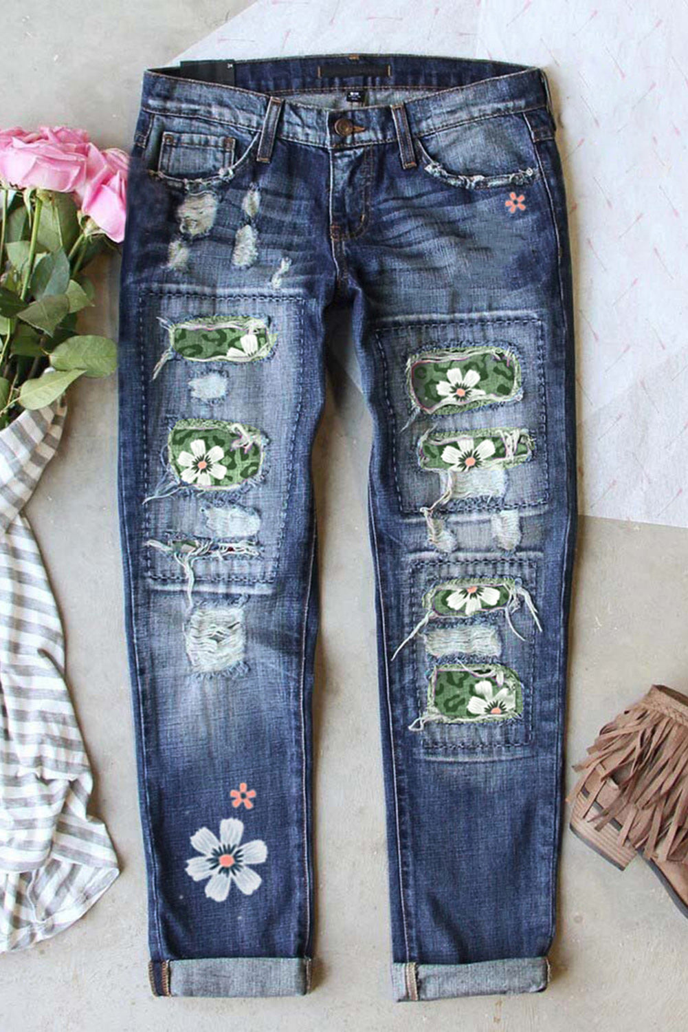 Jeans a vita alta invecchiati patchwork con stampa leopardata floreale verde