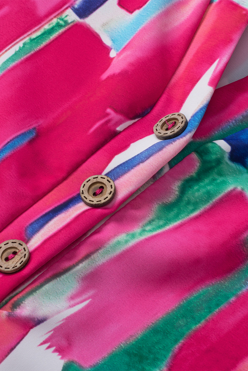 Bluza z V-izrezom z gumbi in abstraktnim vzorcem vrtnic