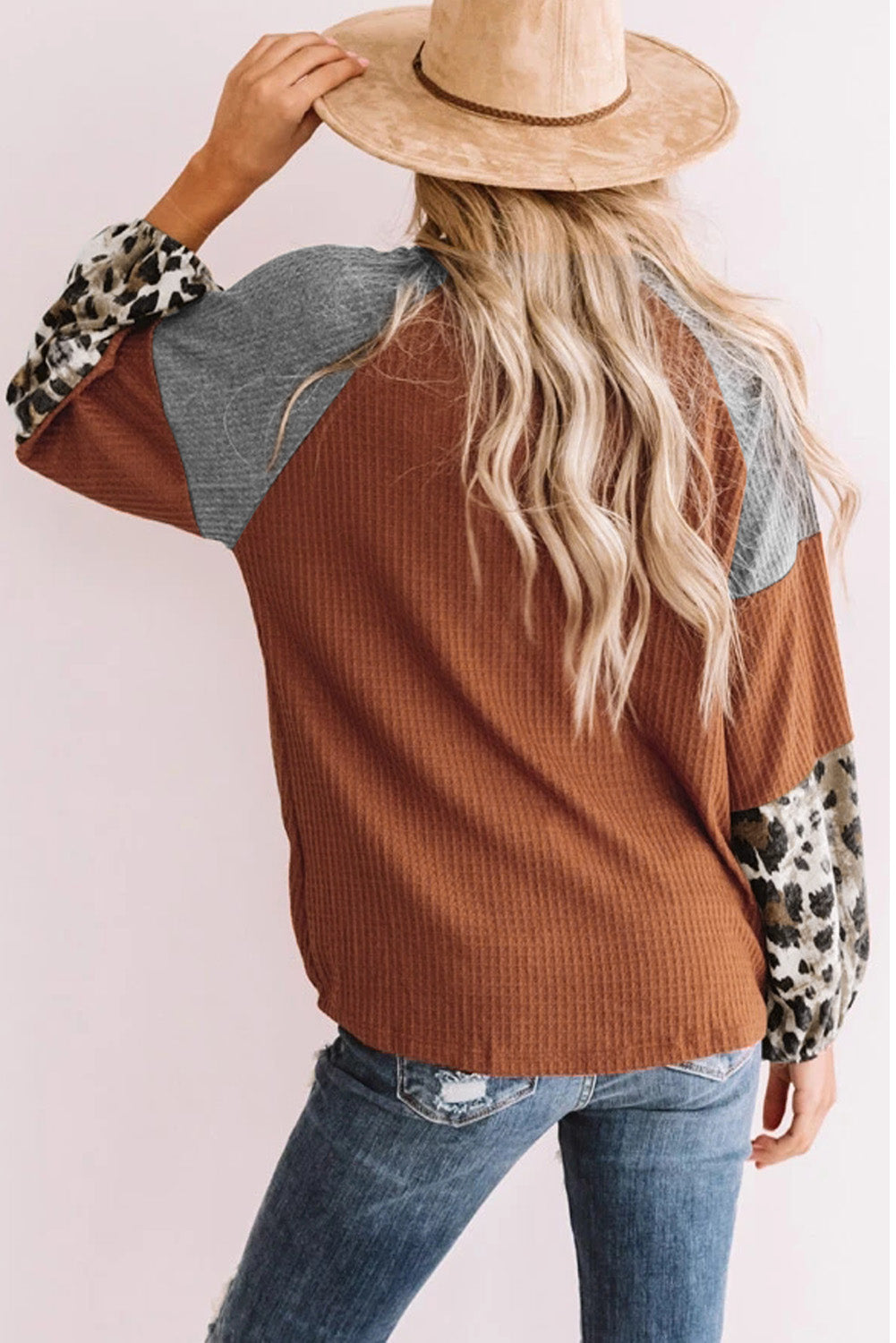 Blouse orange en tricot gaufré à manches longues léopard avec nœud torsadé
