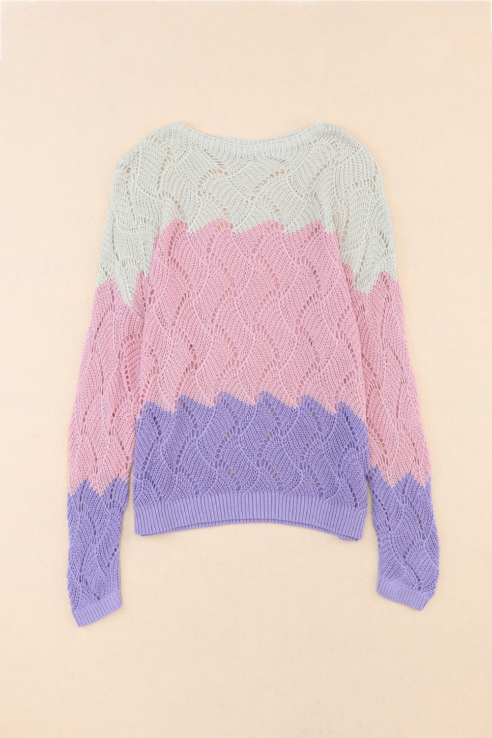 Votel pleten ohlapen pulover v rožnatih barvah