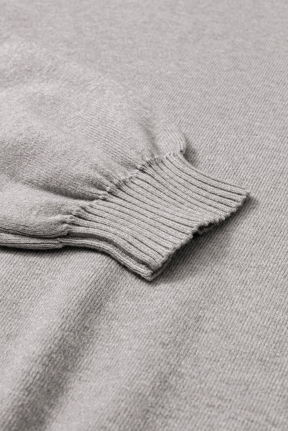 Črn pleten pulover z dolgimi rokavi in ​​dolgimi rokavi