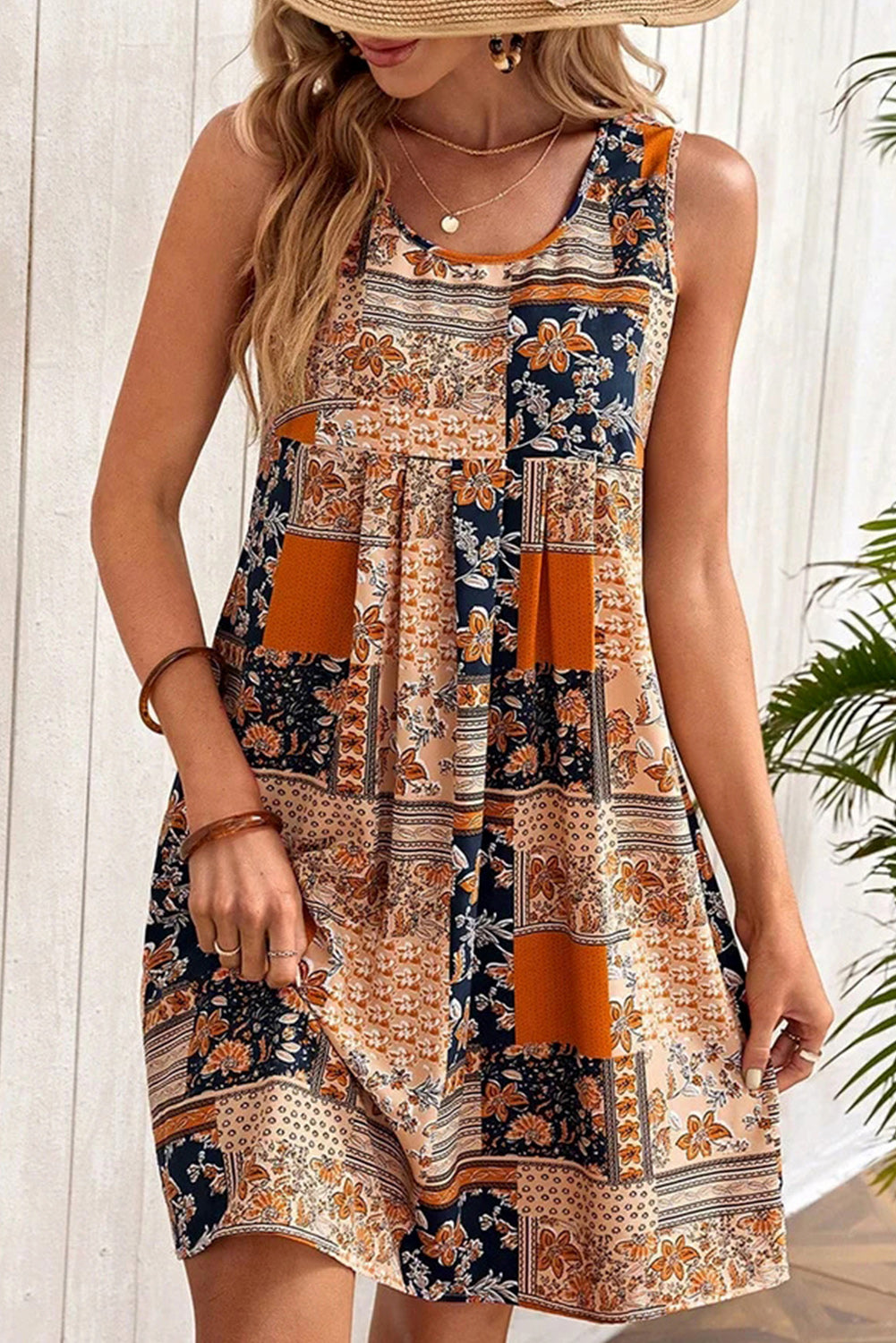 Mini-robe sans manches à imprimé floral rétro orange