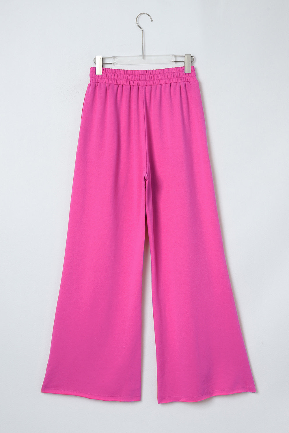 Rosefarbene Hose mit weitem Bein und elastischem Bund und Taschen