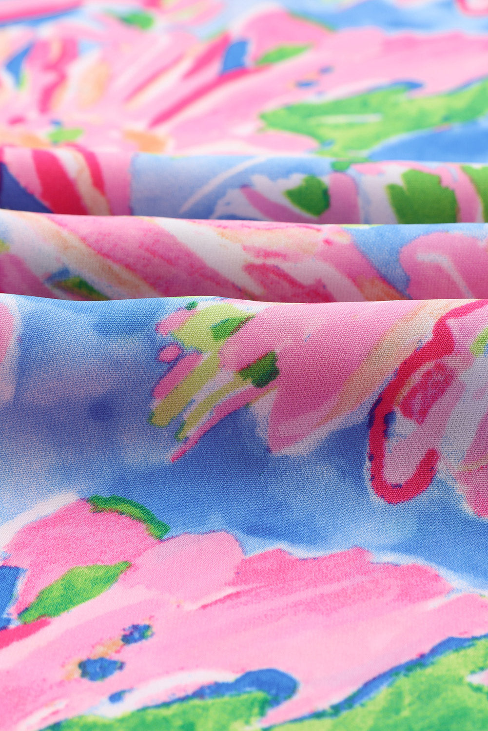 Kombinezon širokih nogavica s ružičastim apstraktnim cvjetnim slikama