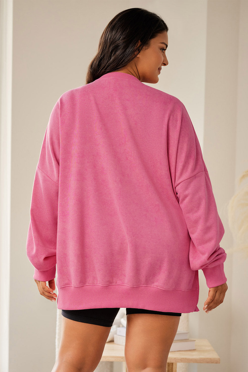 Rosafarbenes Plus-Size-Sweatshirt mit tief angesetzter Schulterpartie und geripptem Saum