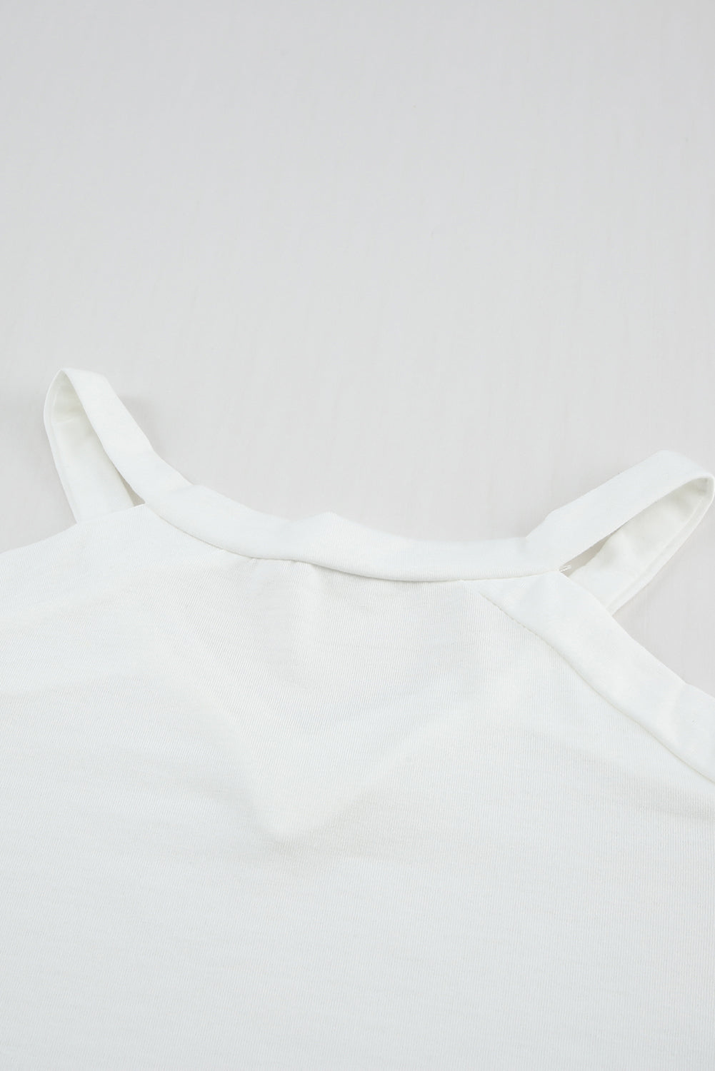 T-shirt à manches longues et découpes à rayures en maille et épaules dénudées