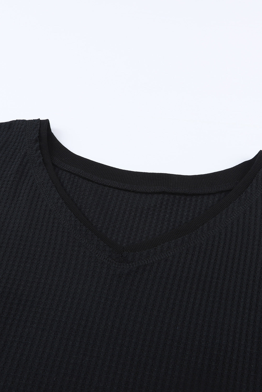 Črna vafelj pletena ohlapna majica s spuščenimi rameni