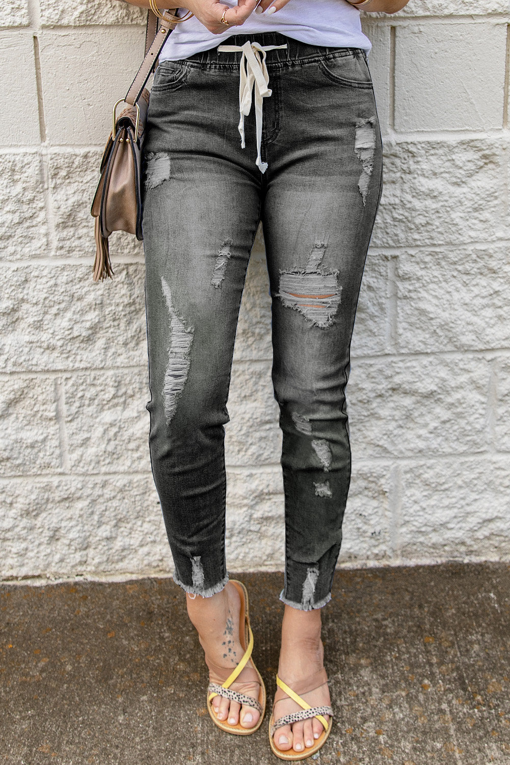 Jeans strappati con foro in vita elastico con coulisse grigio