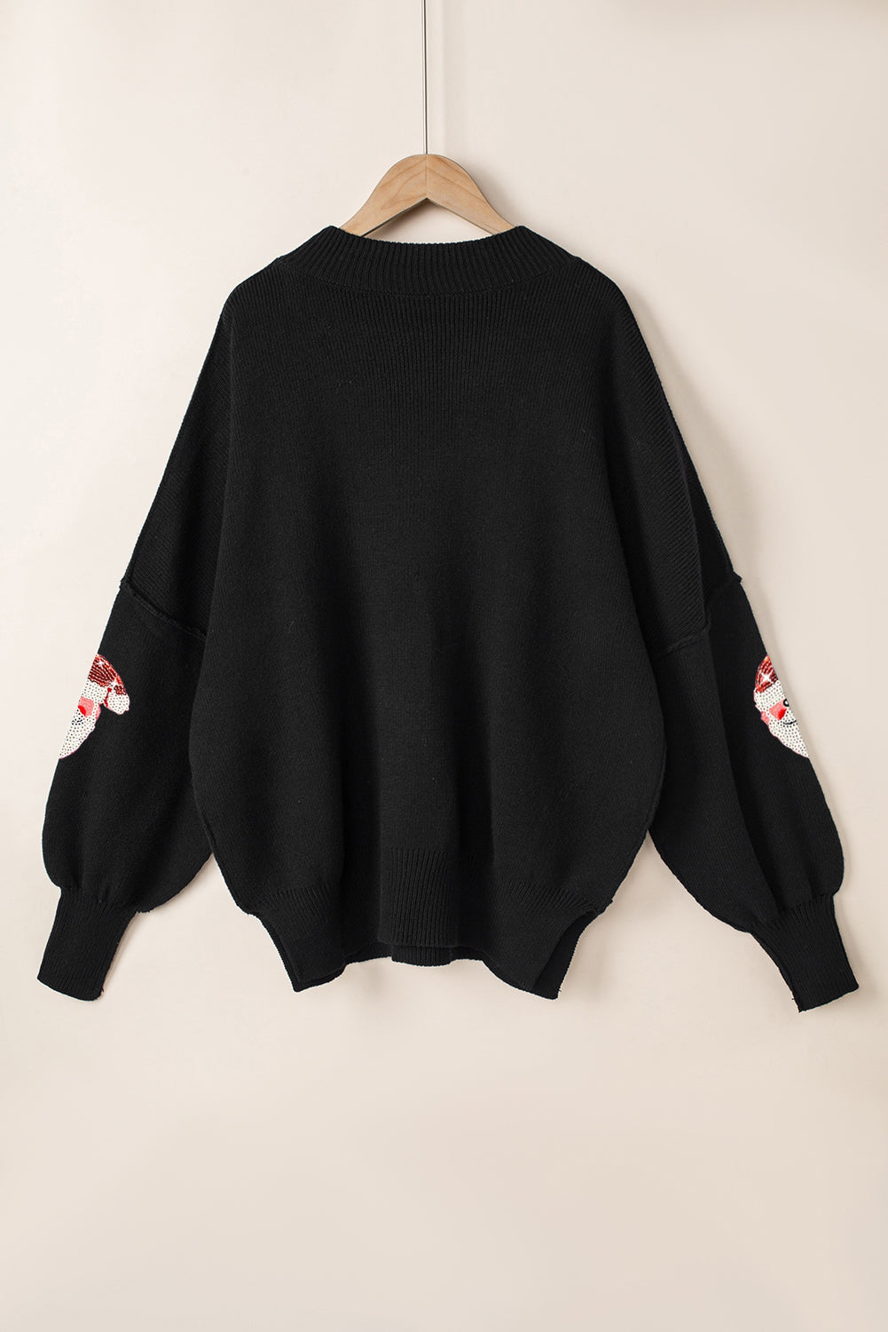 Črn škofovski pulover z bleščicami Božička