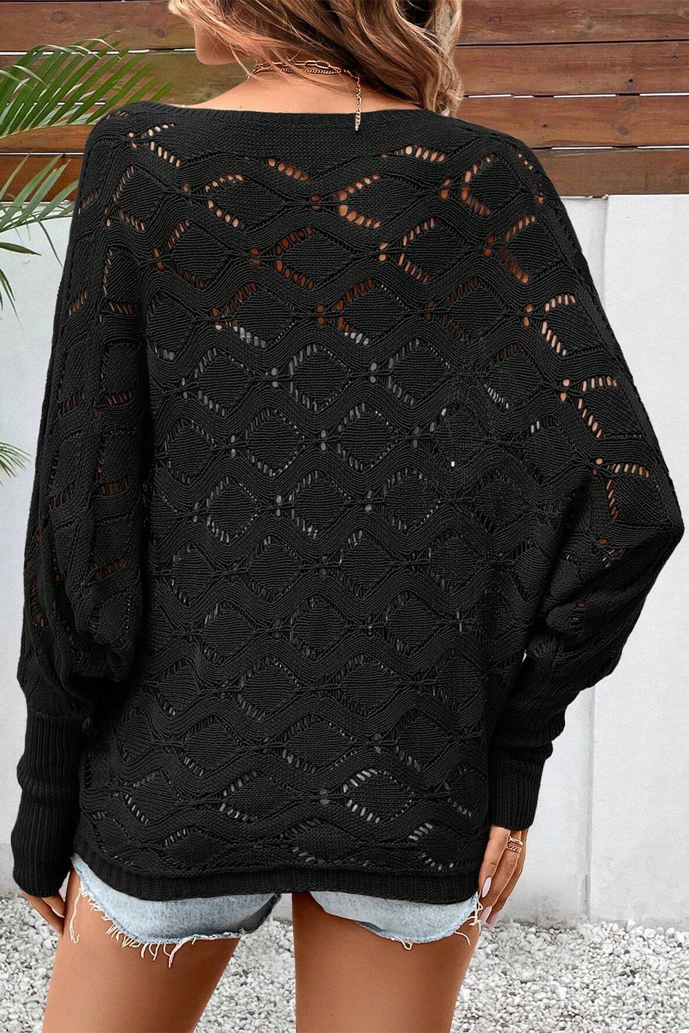 Črn eleganten pulover z rokavi v obliki romba