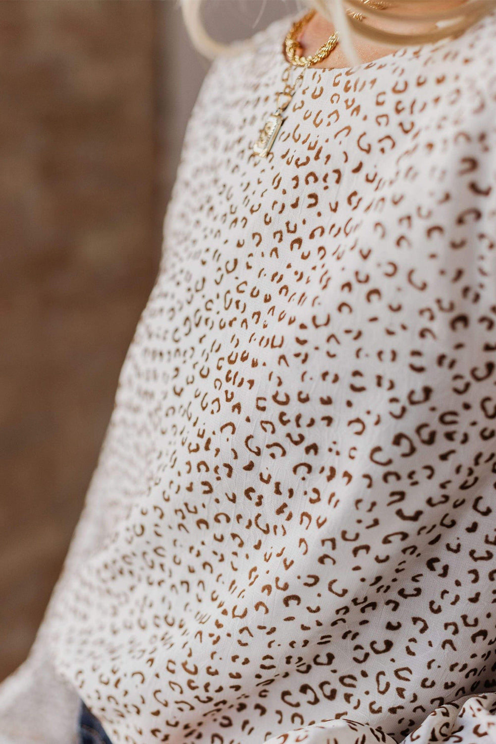 Bluza z dolgimi rokavi z okroglim izrezom v obliki leoparda