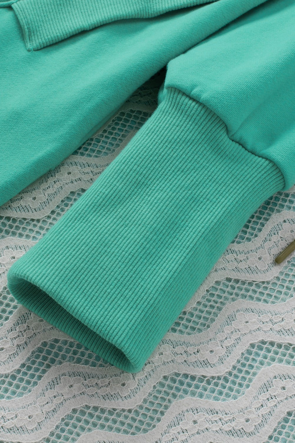 Sweat à capuche Henley turquoise avec poches et manches chauve-souris