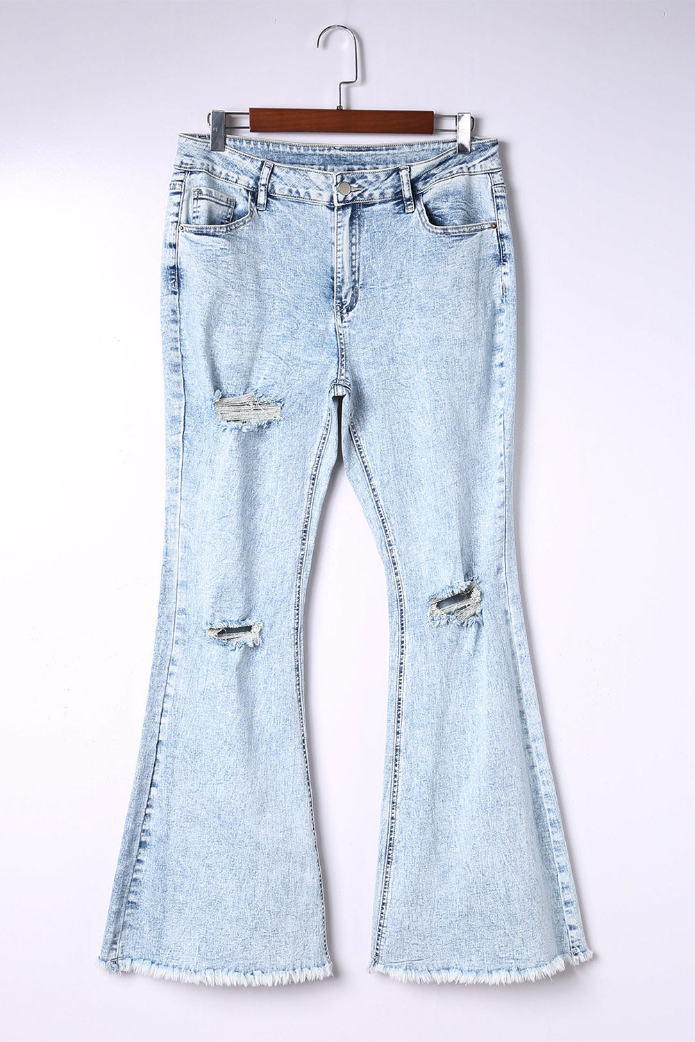 Jeans a zampa con lavaggio acido invecchiato blu cielo