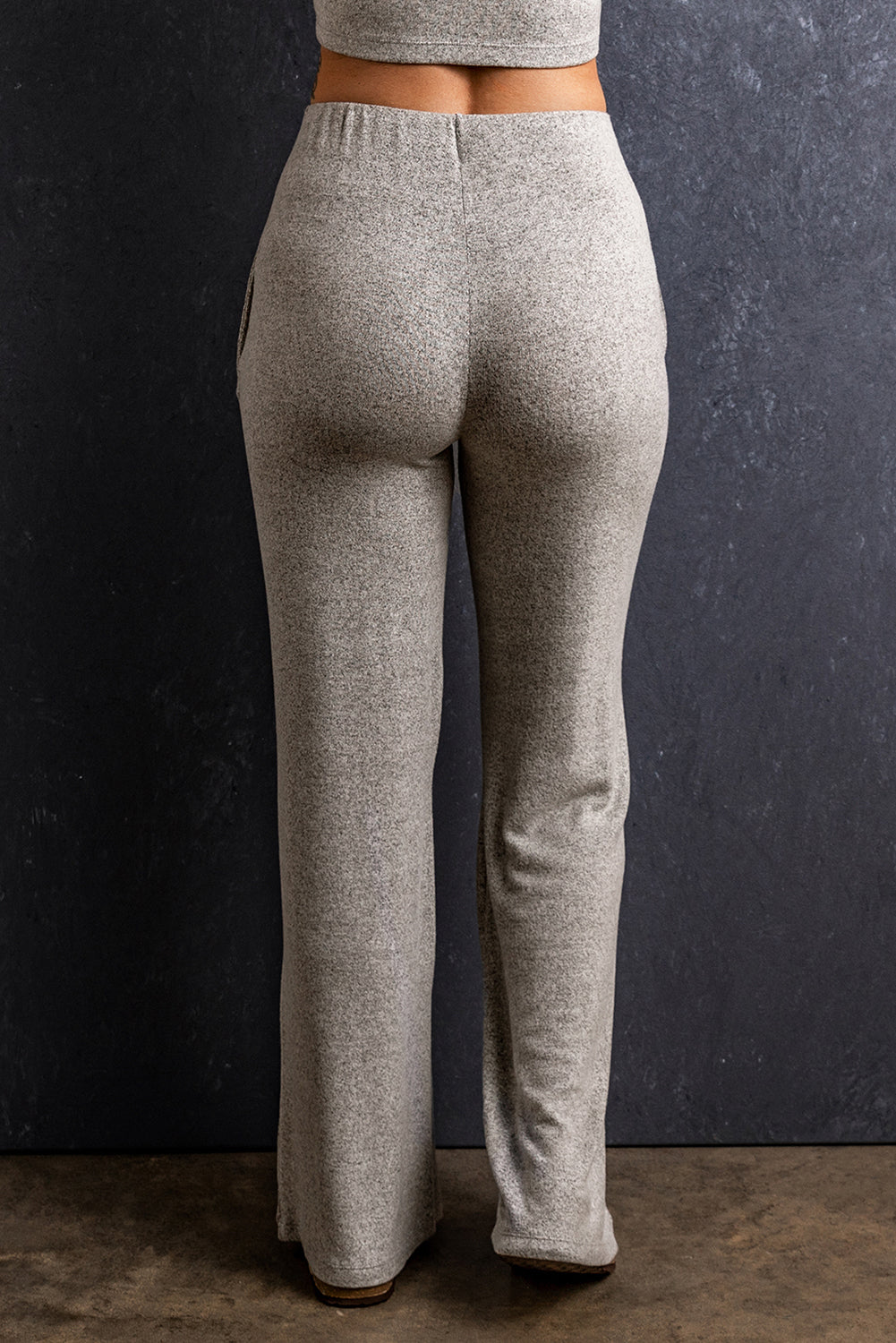 Pantaloni dritti larghi con tasche in vita elastica grigio chiaro