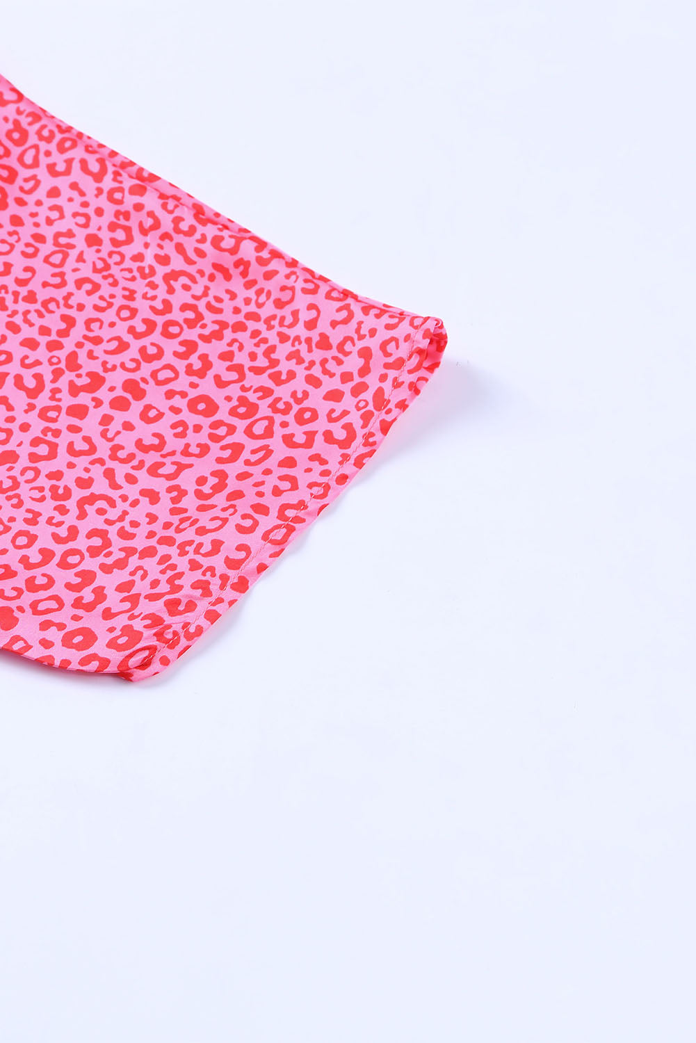 Haut surdimensionné à manches mi-longues et col en V à imprimé léopard rose