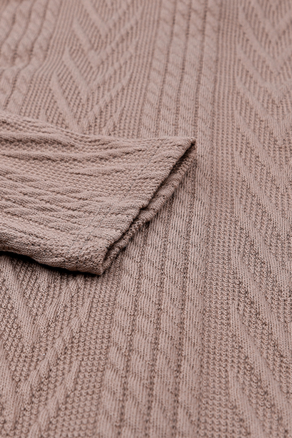 Veste kaki oversize en tricot texturé boutonnée sur le devant