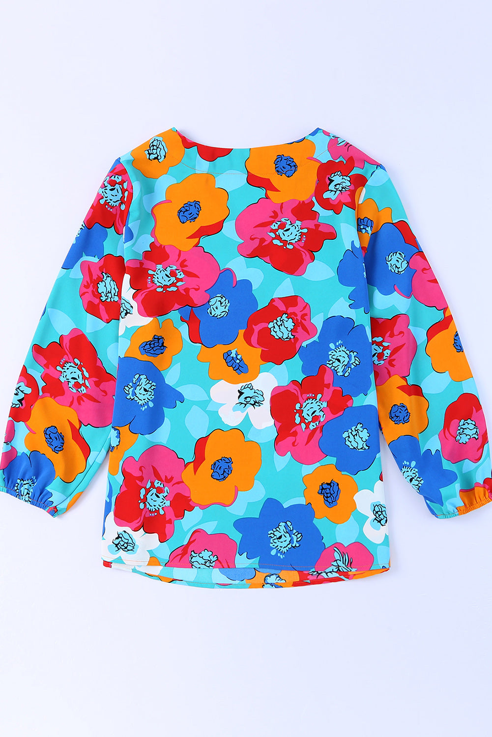 Bluza s 3/4 rokavi z V izrezom in večbarvnim cvetličnim vzorcem