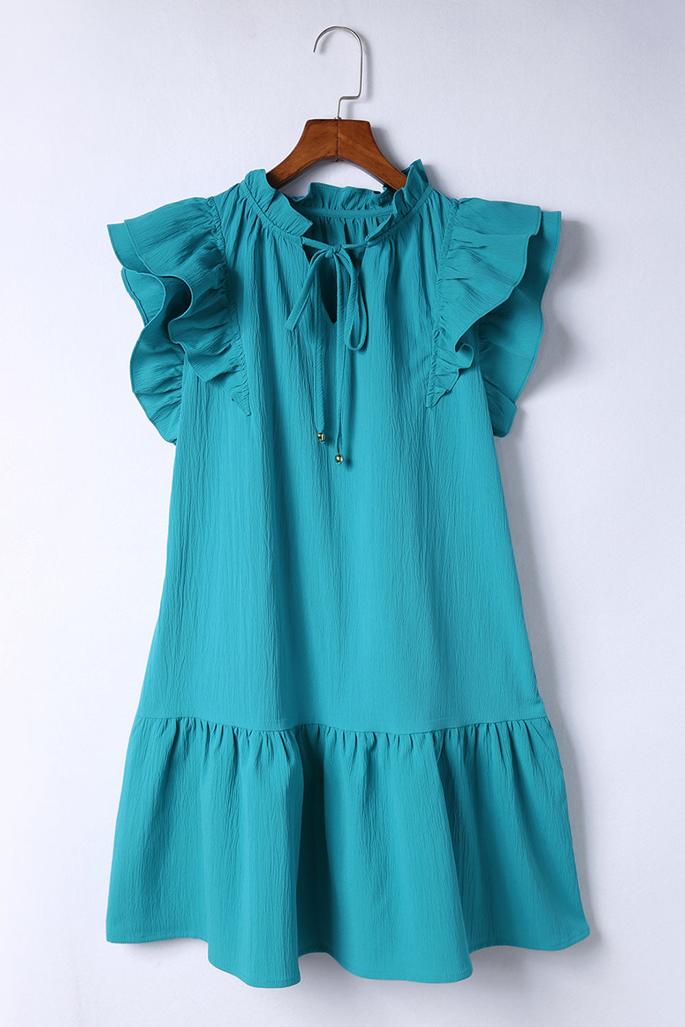 Mini-robe verte à manches volantées et poches