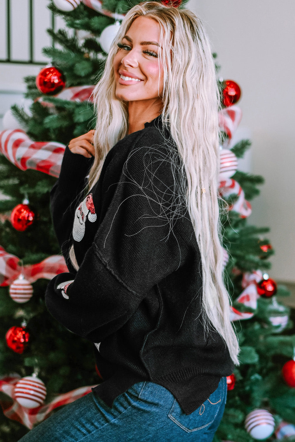 Črn škofovski pulover z bleščicami Božička