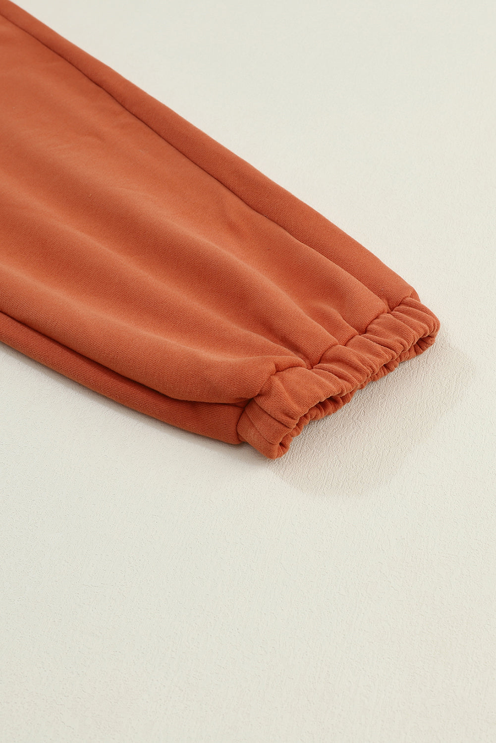 Pantalon de jogging orange avec poches cargo et cordon de serrage