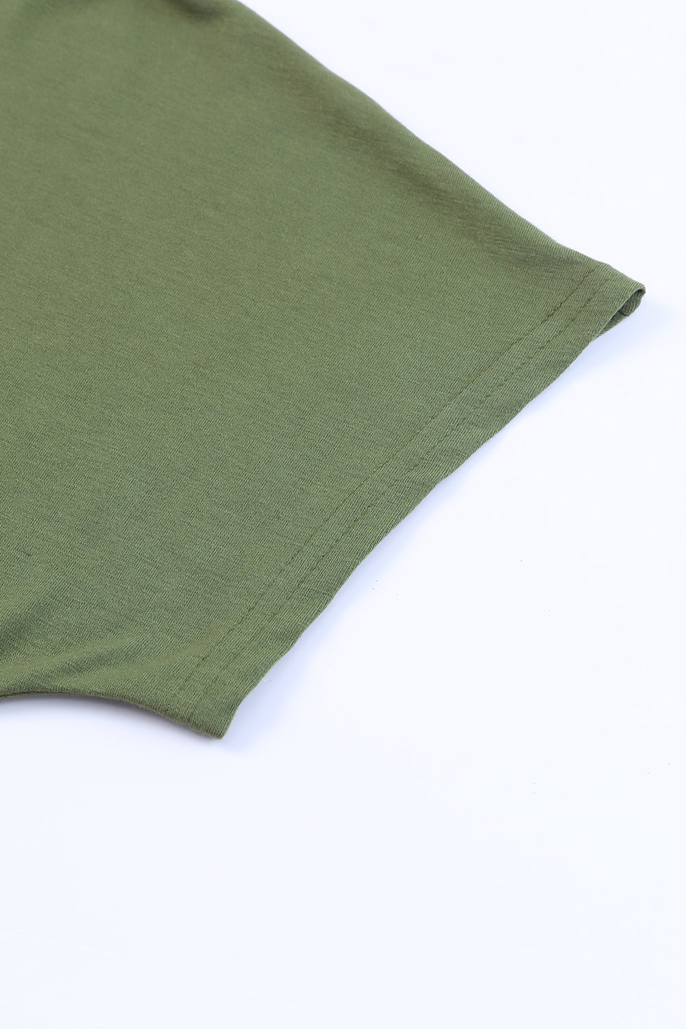 Top tunica a maniche corte con tasche laterali verde chiaro
