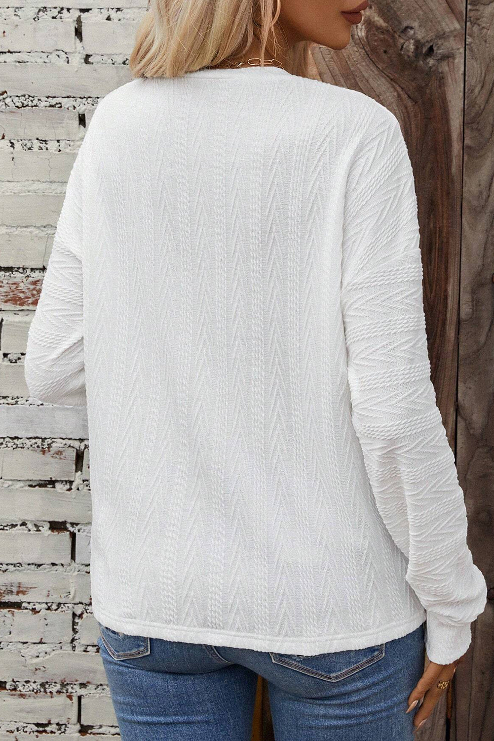 Haut en tricot texturé blanc à col rond et épaules tombantes