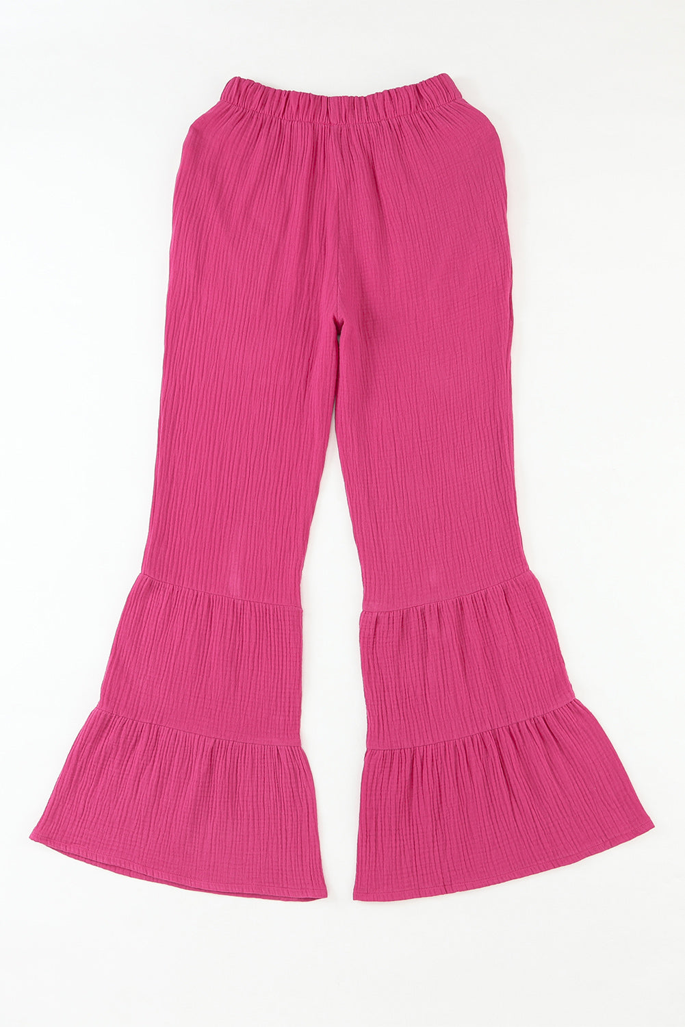 Pantaloni con fondo a campana con volant a vita alta testurizzati rosa