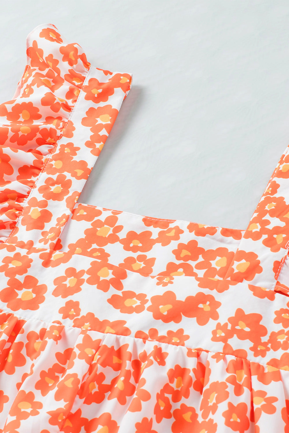 Orangefarbenes Tanktop mit Blumendruck und eckigem Ausschnitt mit Rüschen