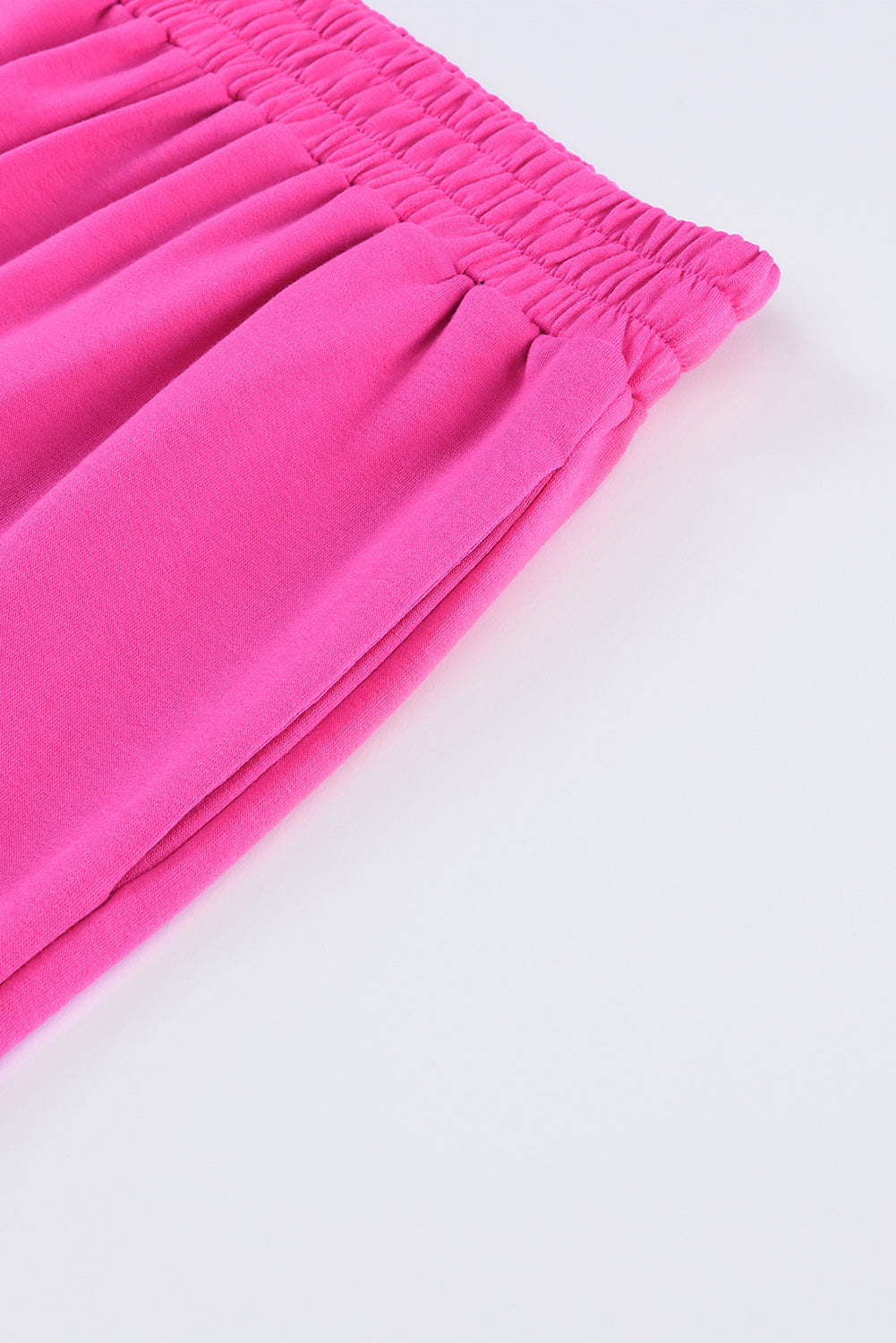 Rosefarbene Hose mit weitem Bein und elastischem Bund und Taschen