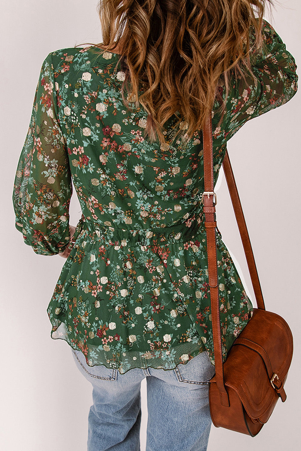 Zelena majica z v-izrezom in peplum s cvetličnim potiskom