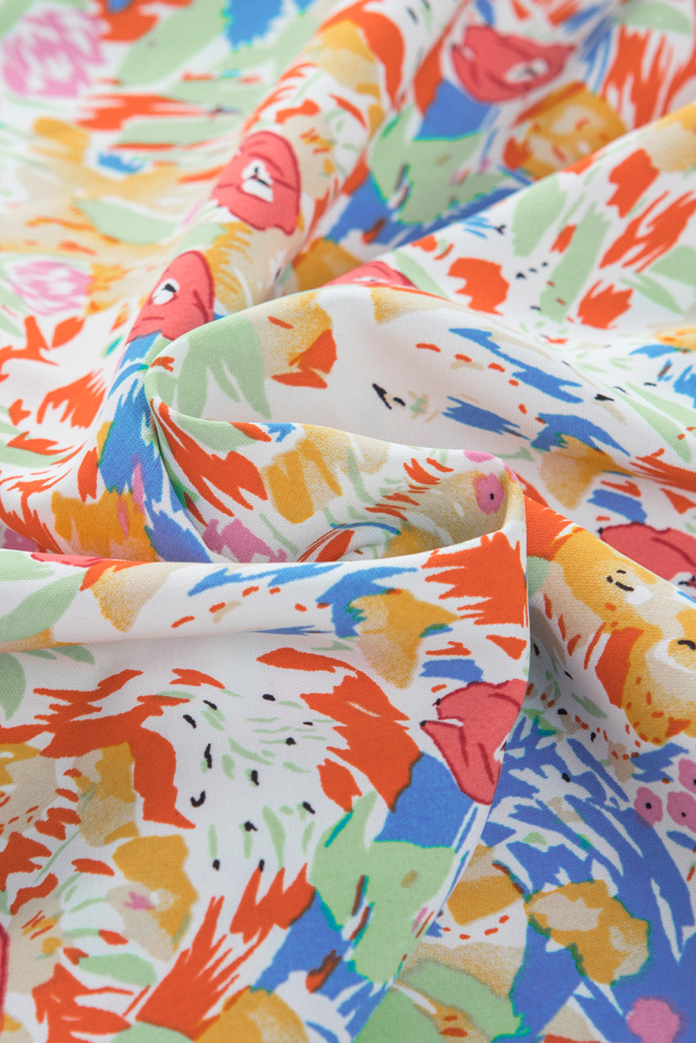 Mehrfarbige Bluse mit gesmokten Puffärmeln und abstraktem Print