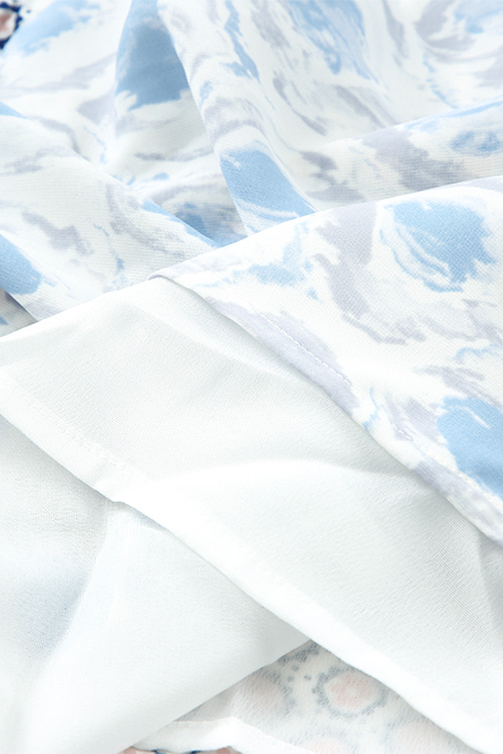 Robe longue sans manches à col fendu et imprimé abstrait bleu ciel