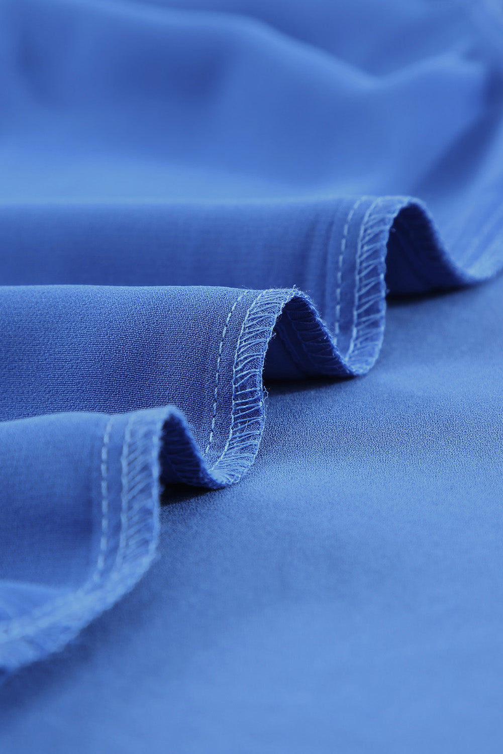 Camicetta ampia plissettata con collo diviso blu