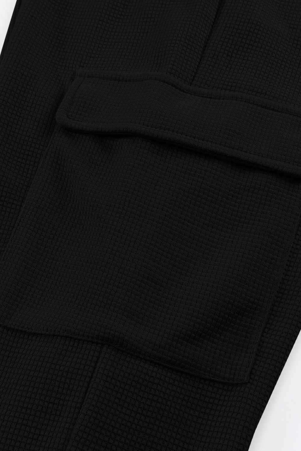 Crne hlače za trčanje s kargo džepovima teksture vafla
