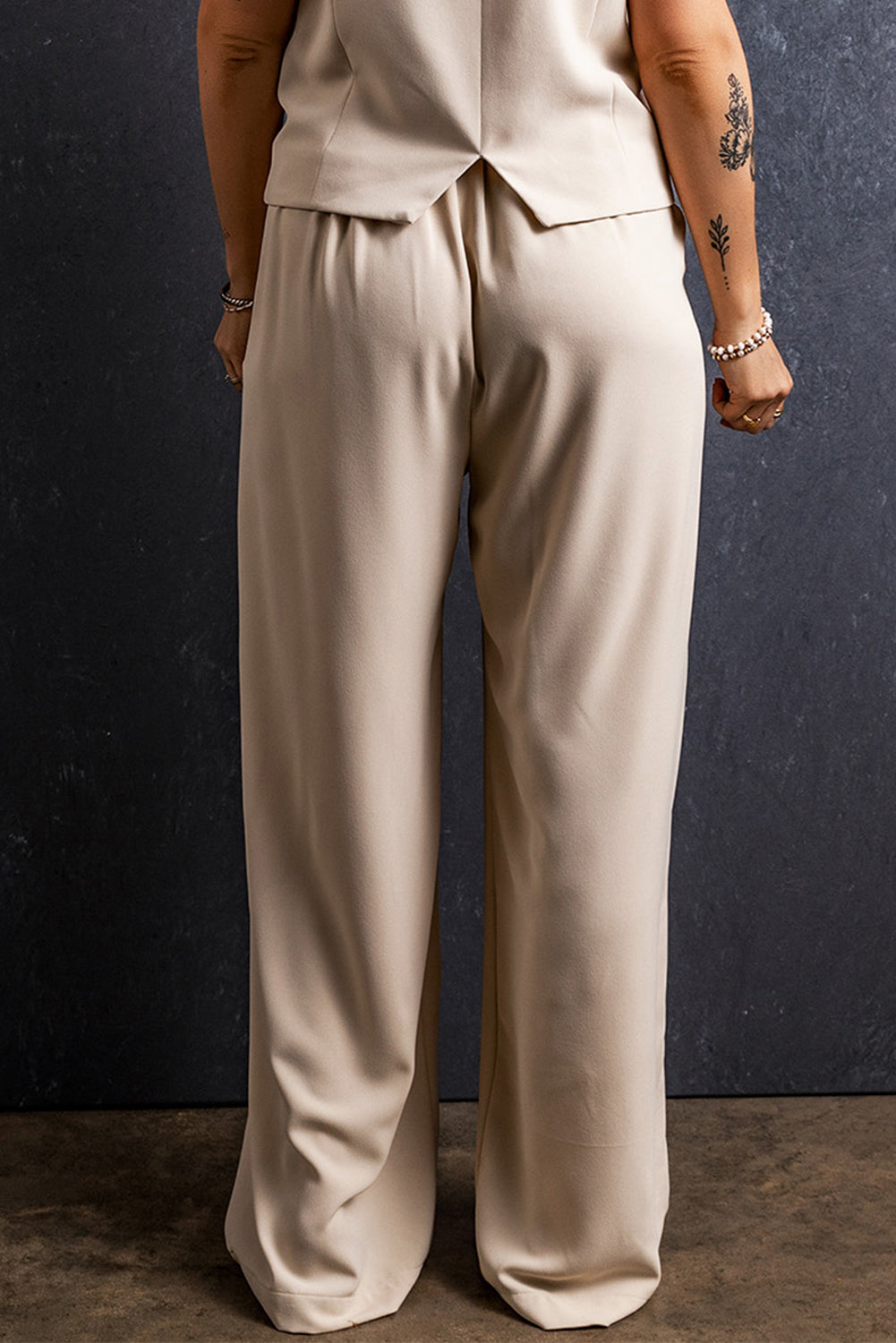 Pantalon large plissé à taille élastique abricot
