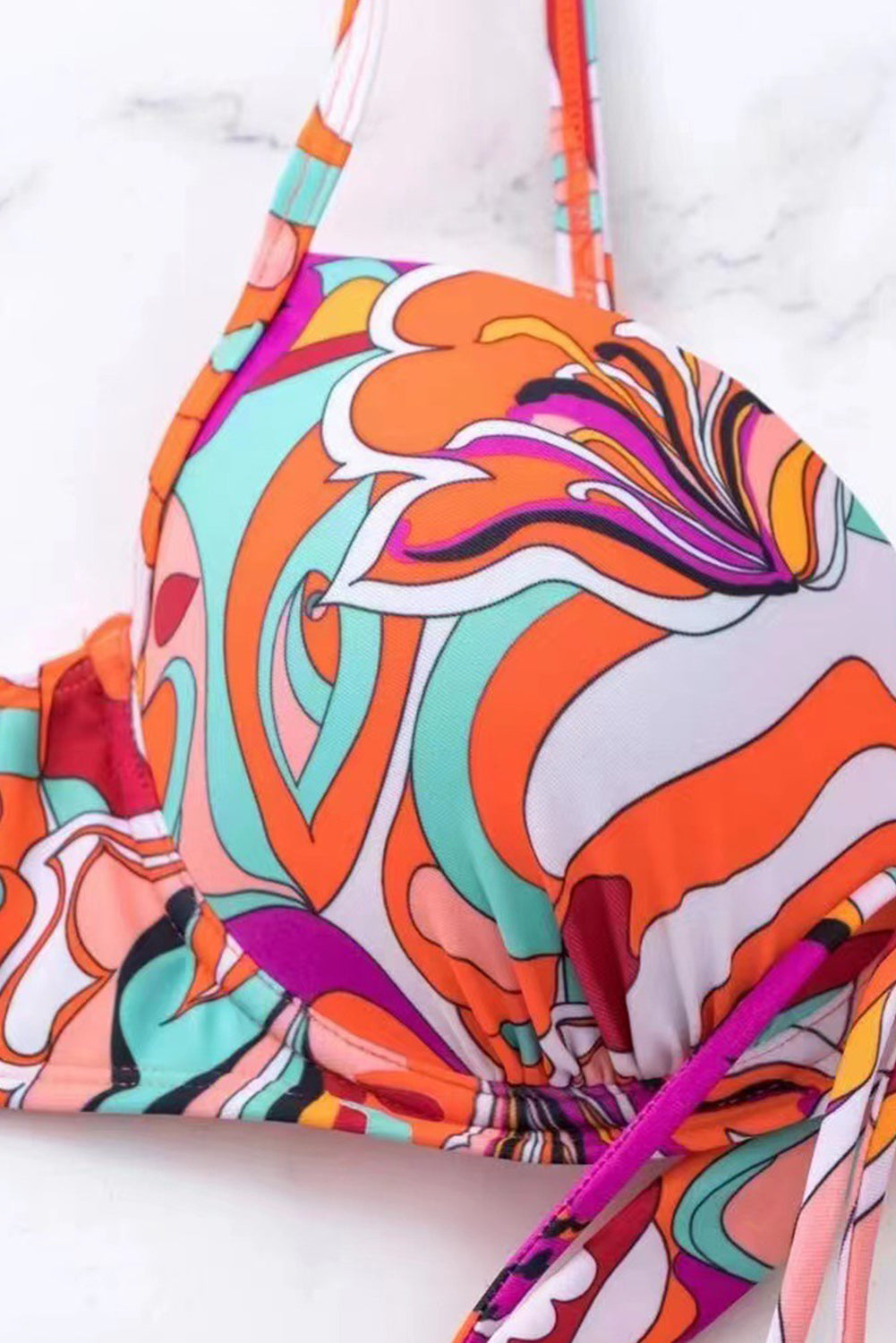 Narančasti dvodijelni bikini s bralette hlačama na vezanje i cvjetnim grafitima