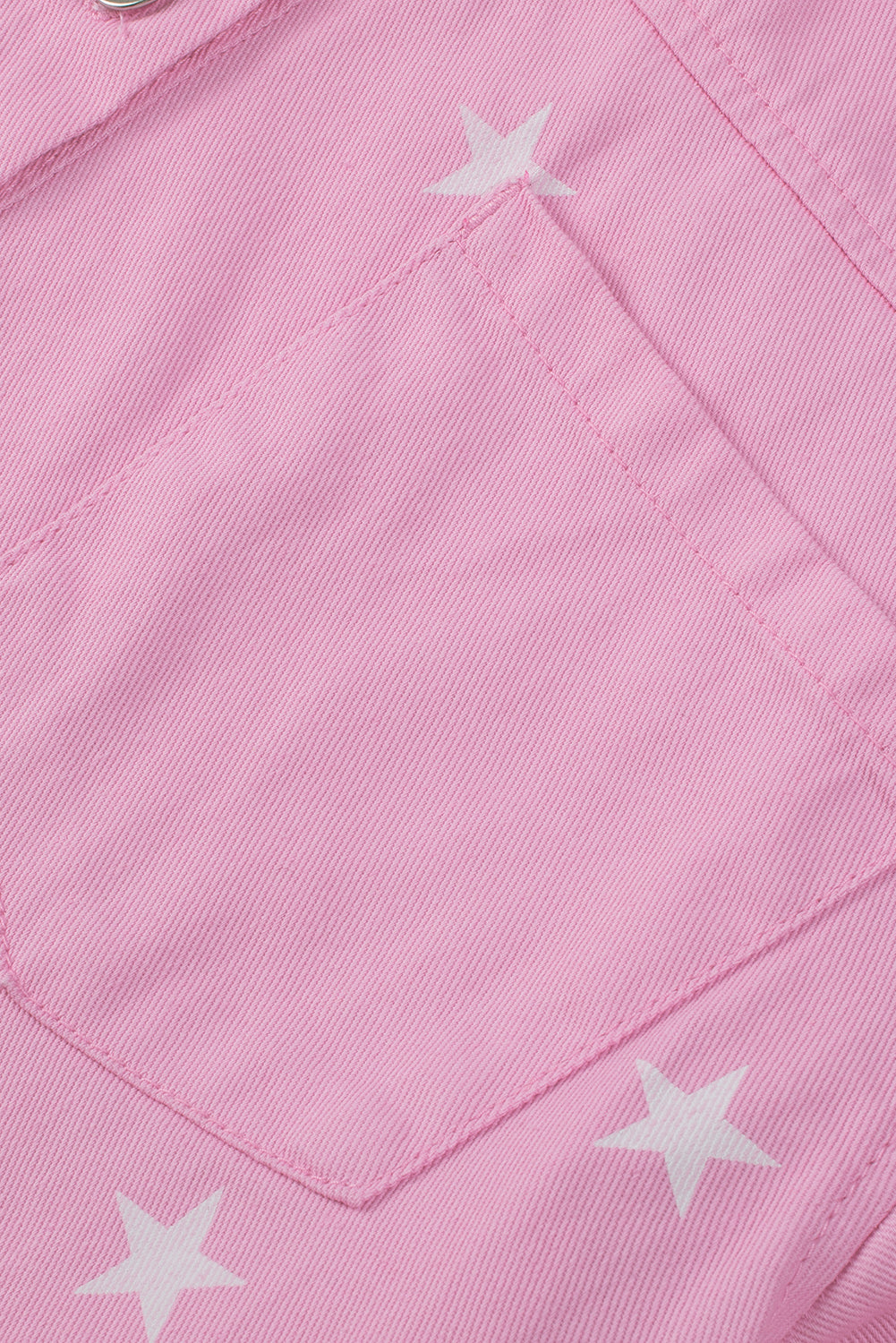 Rosa Jeansjacke mit Sternenmuster und Knöpfen