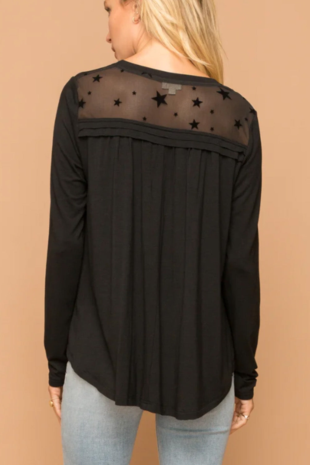 Schwarze Bluse mit Stern-Mesh-Einsatz und drapierten Details