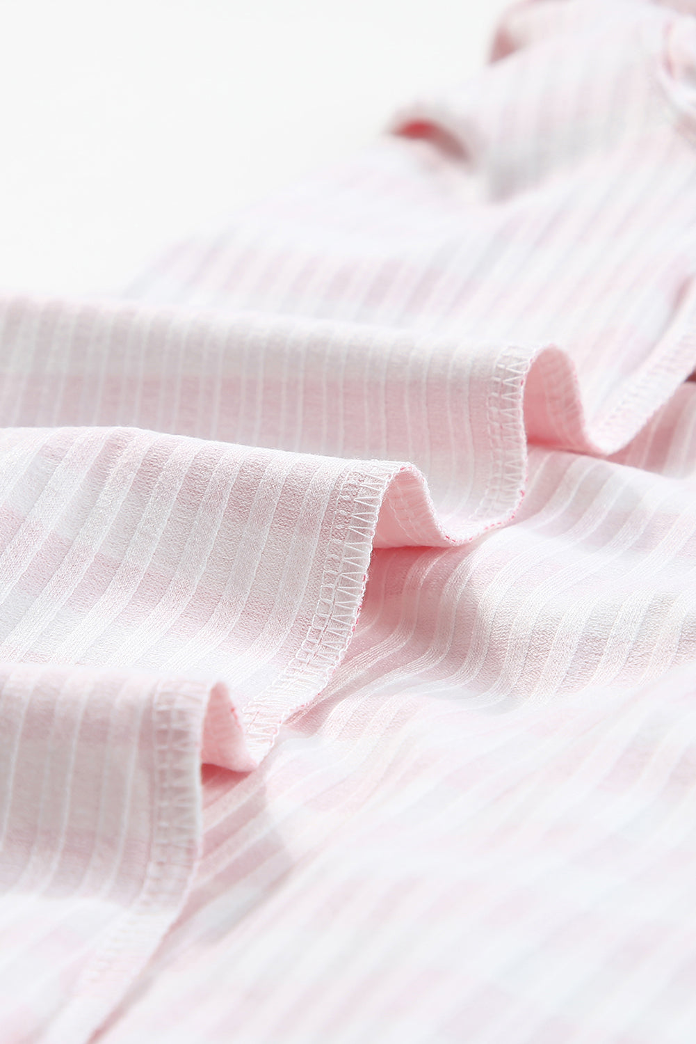 Strukturiertes Strick-Langarm-T-Shirt mit erdbeerrosa gestreiftem Print